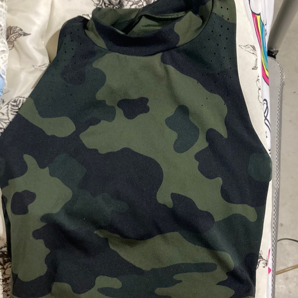 This is a sleeveless workout crop shirt.